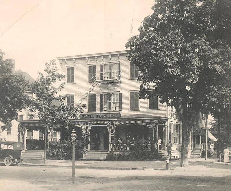 A vintage black and white photo captures the historic Hotel Fauchère facade in the Milford historic district.