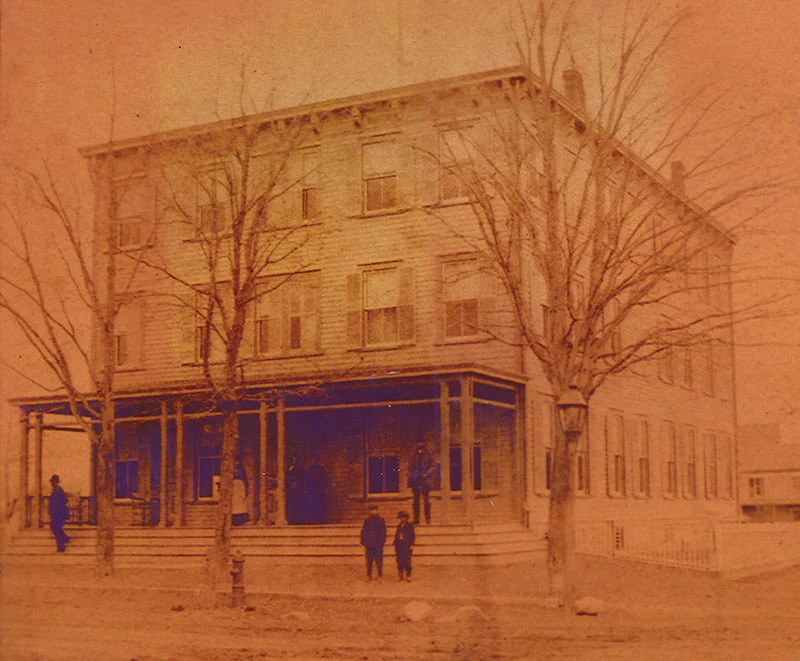 A vintage sepia photograph of the historic Hotel Fauchère building located in the Milford historic district.