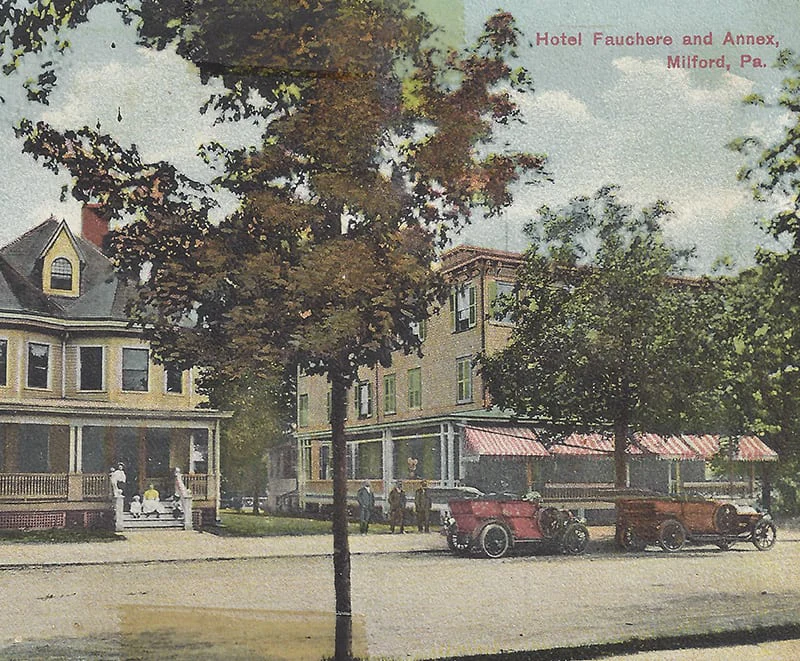 a painting of a street scene with cars parked in front of a hotel